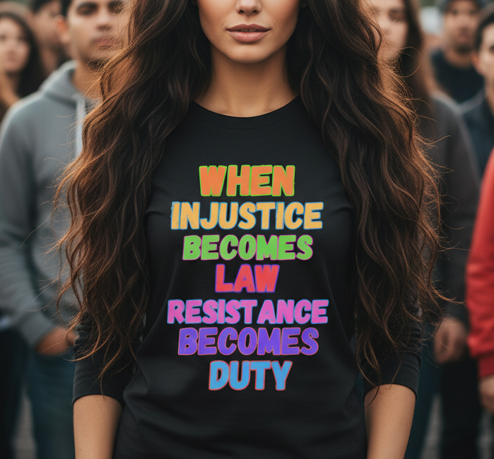 Beautiful woman with a black long sleeve tee that has colorful font with the words "if injustice becomes law than resistance becomes duty"