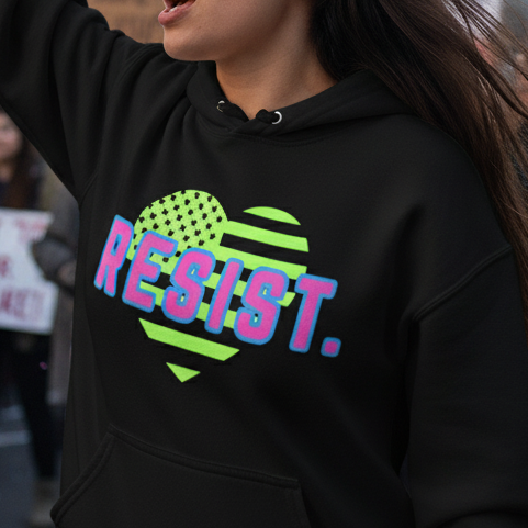 Woman holding a protest sign with 'Fight for our Future!' in an urban setting.