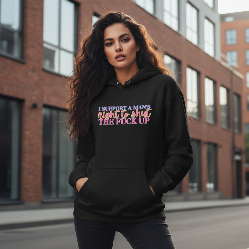 Beautiful woman wearing a black hoodie with colorful words saying "I support a man's right to shut the fuck up"